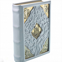Библия в кожаном переплете с латунной накладкой
