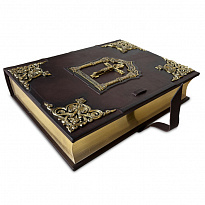 Библия большая в миниатюрах Палеха с литьем в кожаном переплете.